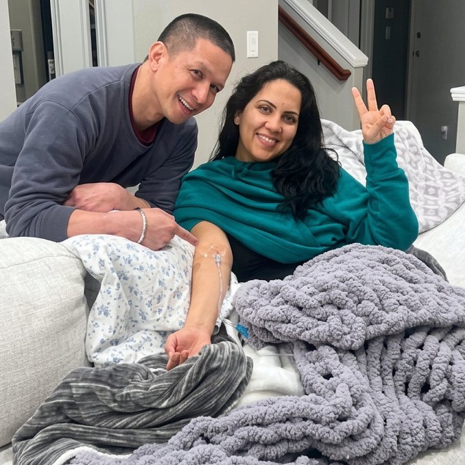 Couple receiving IV therapy together at home